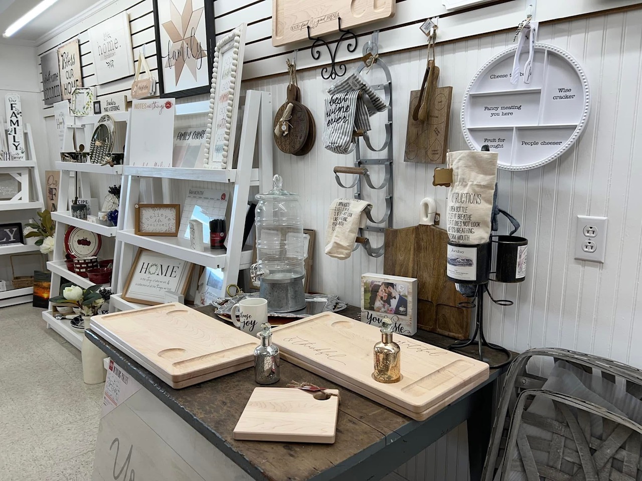 Charcuterie boards, framed signs, and home decor at Back Porch Gifts